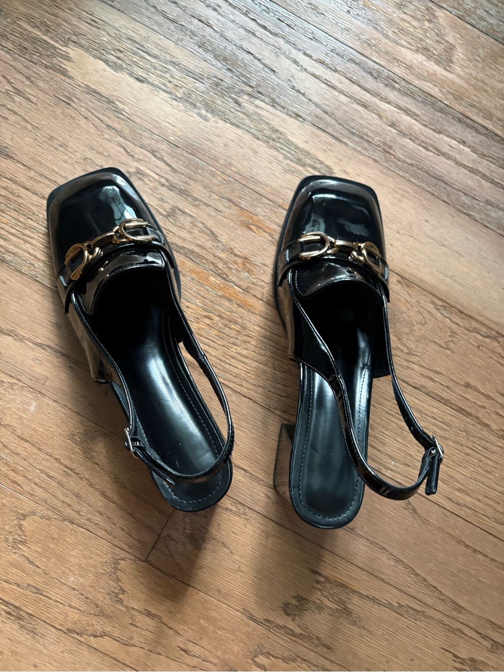 Black Patent Slingback Mules with Gold Horsebit Accent